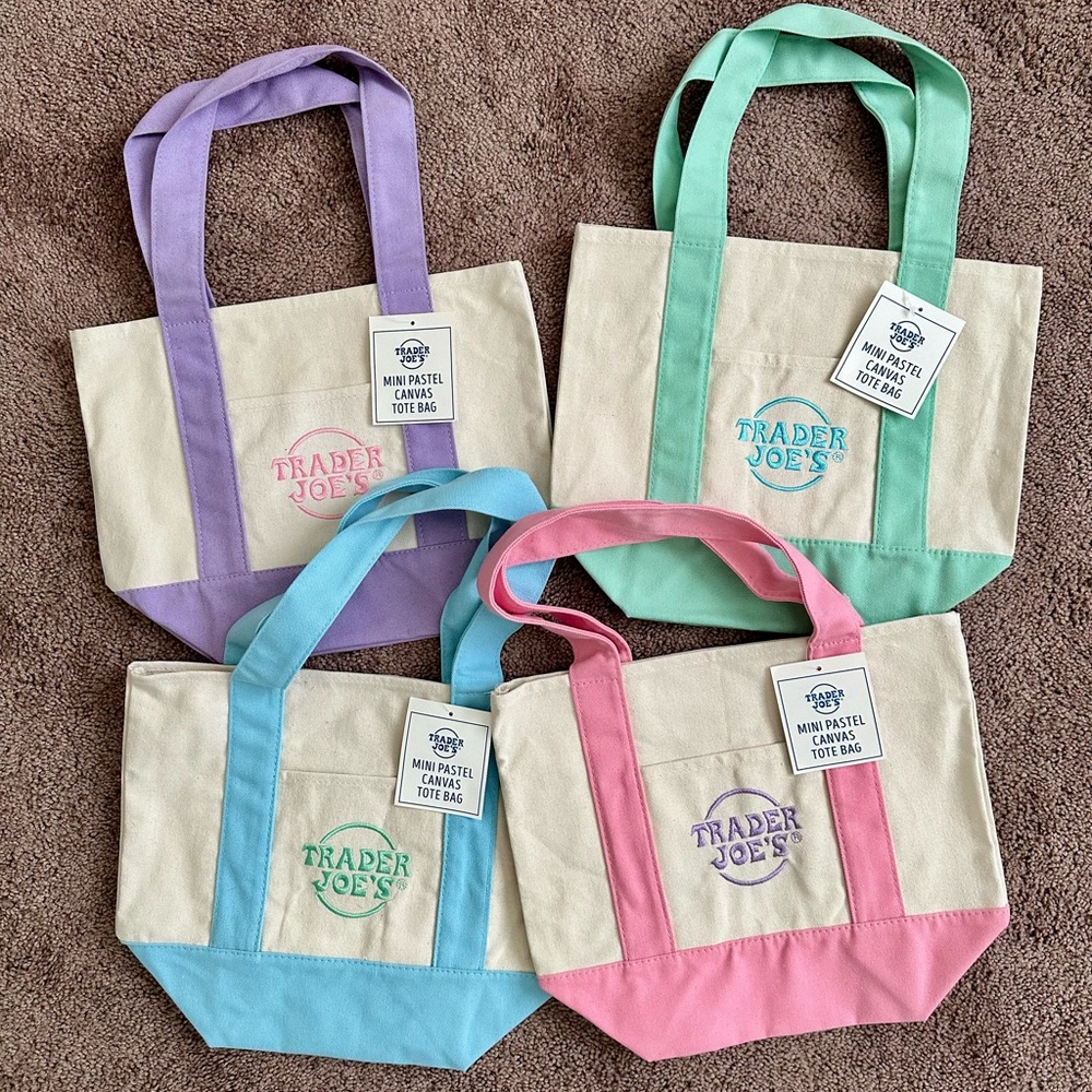 Trader Joe’s Limited Edition pastel mini canvas totes. 
Set of 4. Includes pink!